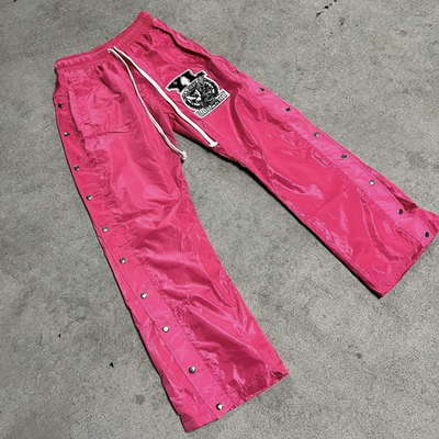 Αγορά Άνδρες Baggy Fit Νάιλον Sweatpants με Windproof Σχεδιασμό και Distressed Βένδυμα online manufacture