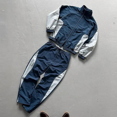 Αγορά Προσαρμοσμένο Windbreaker φόρεμα γυμναστικής Baggy Mens Τροχιακό κουστούμι υπερμεγέθους Polyester Nylon φόρεμα γυμναστικής Windbreaker φόρεμα γυμναστικής Set άνδρες online manufacture